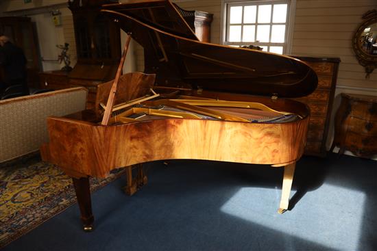 A Bluthner Model 6 flame mahogany cased grand piano, W.4ft 10in. L.6ft 3in. H.3ft 3in.
